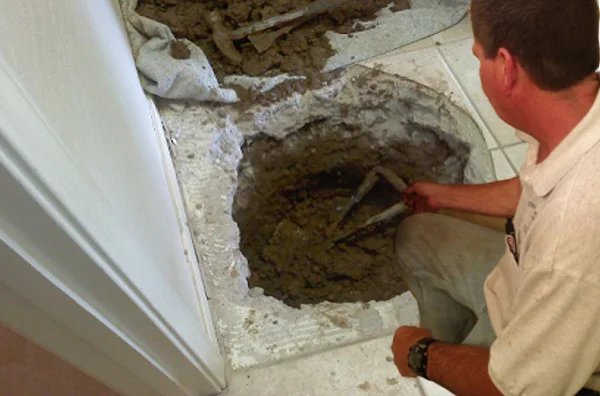 Plumber working on a home plumbing service in Chandler